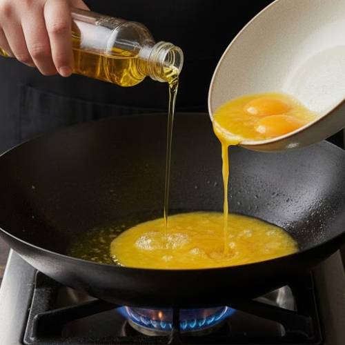 Step 5: Heat the Wok and Cook the Eggs