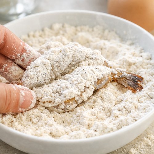 Step 5: Begin the Breading Process—Flour First